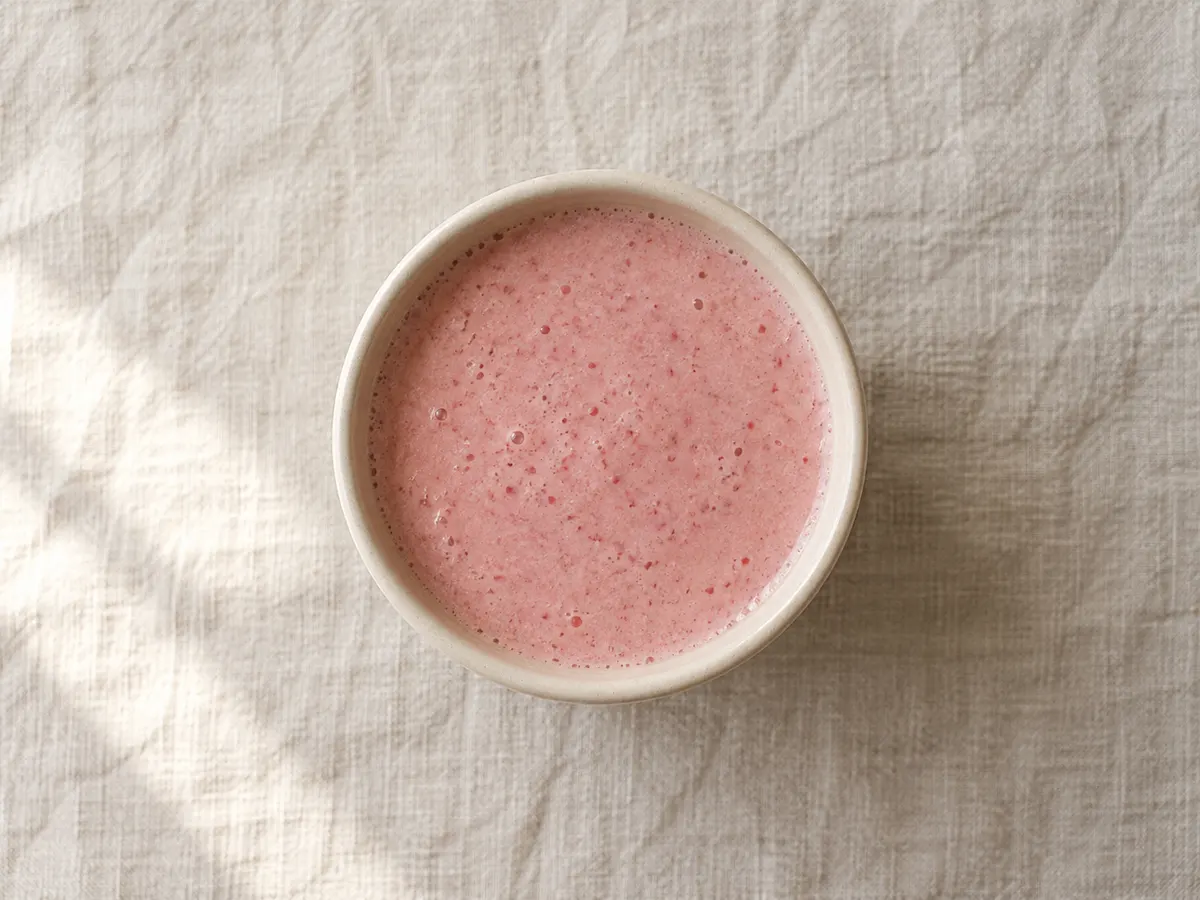 Greek yogurt, banana, and strawberry smoothie, seen from above